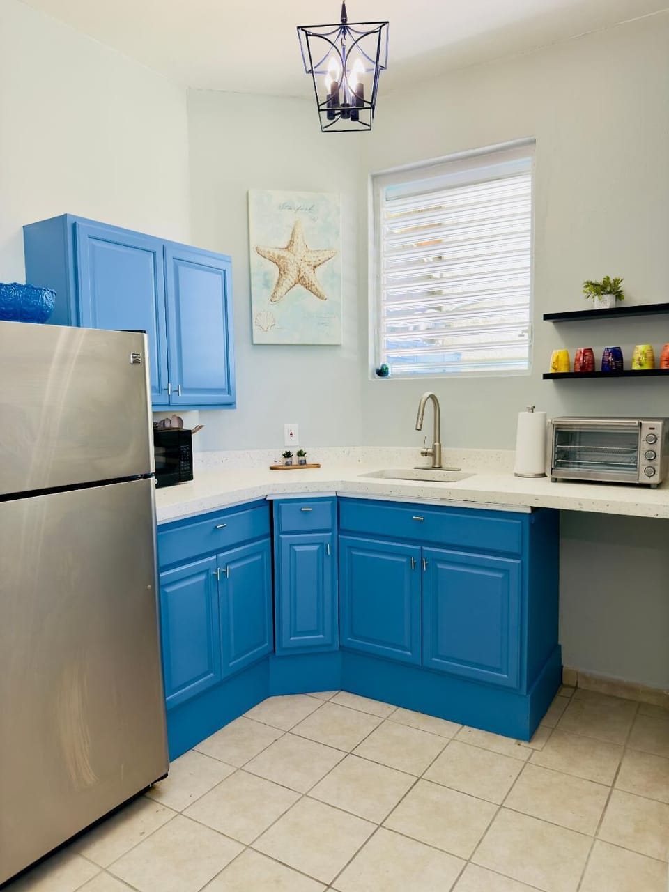 Kitchen w/ microwave, toaster oven, air fryer, 2 burner induction stove & more.