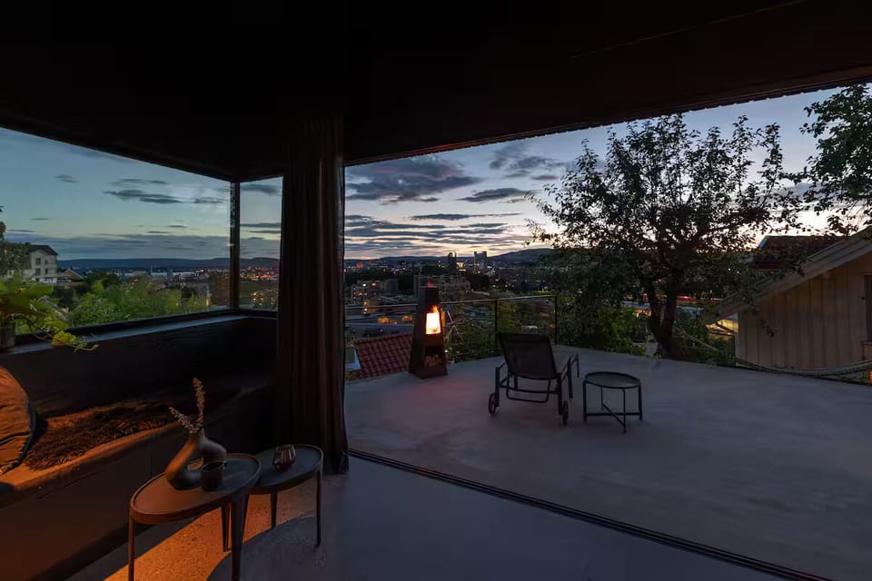 Unwind on the private terrace with a warm fire and a stunning Oslo sunset