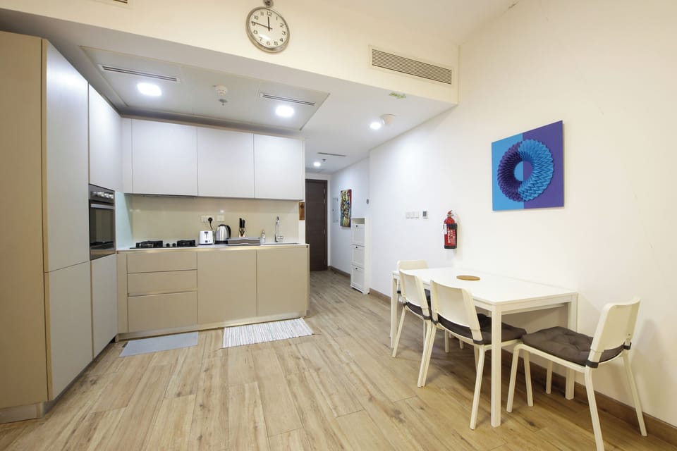 Fully fitted kitchen and 4-seater dining area