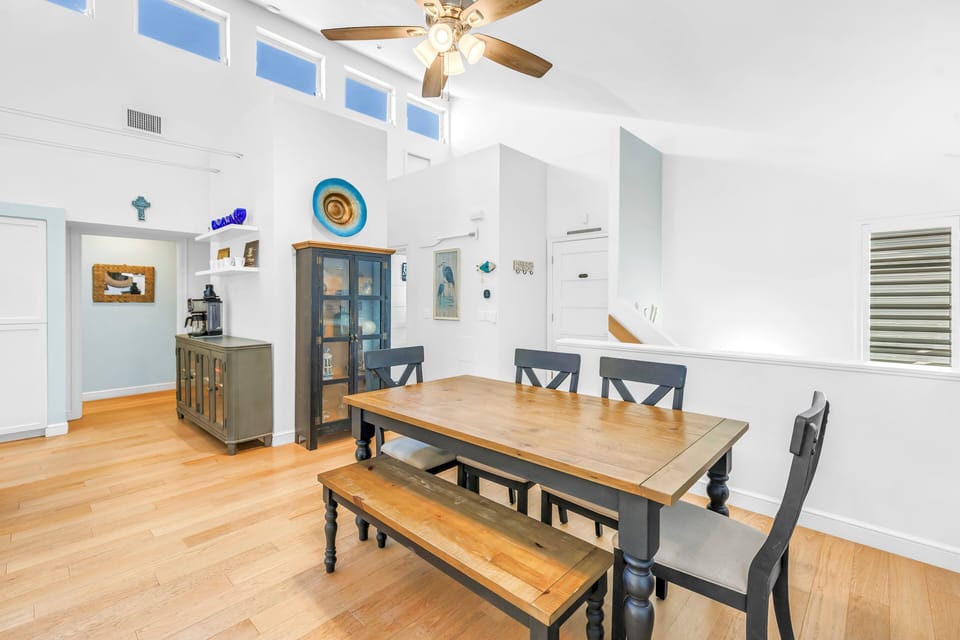 Spacious dining table with natural light.