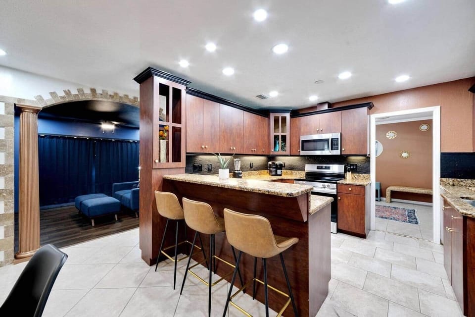 Fully stocked kitchen with all essentials. Keurig, air fryer, wine glasses, bakeware, etc...