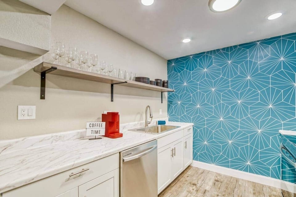 Kitchen includes Keurig Coffee maker, plates, pots, pans, and silverware for all your cooking needs.