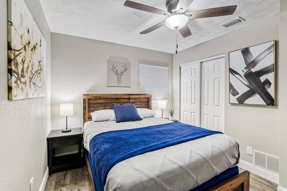 Bedroom #3 with queen-sized bed and Smart TV