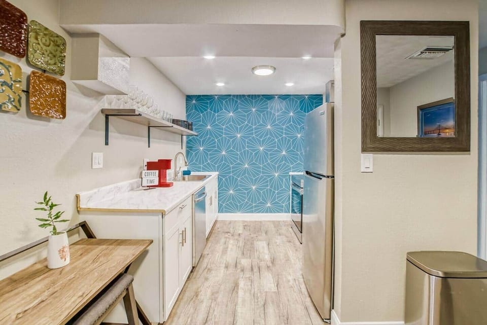 Kitchen includes Keurig Coffee maker, plates, pots, pans, and silverware for all your cooking needs.
