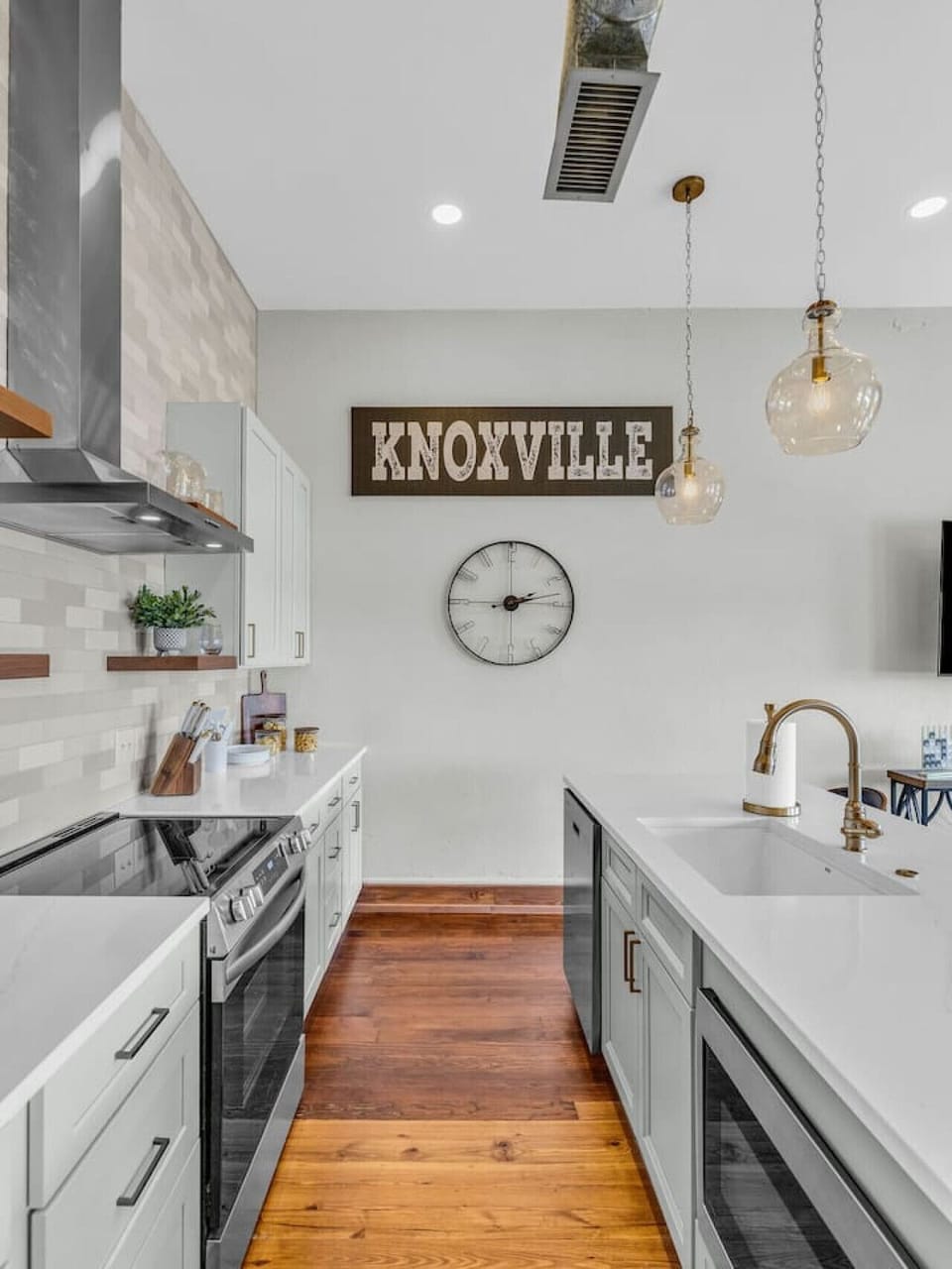Kitchen: Modern design with sleek appliances and a charming Knoxville vibe. Cook with style!