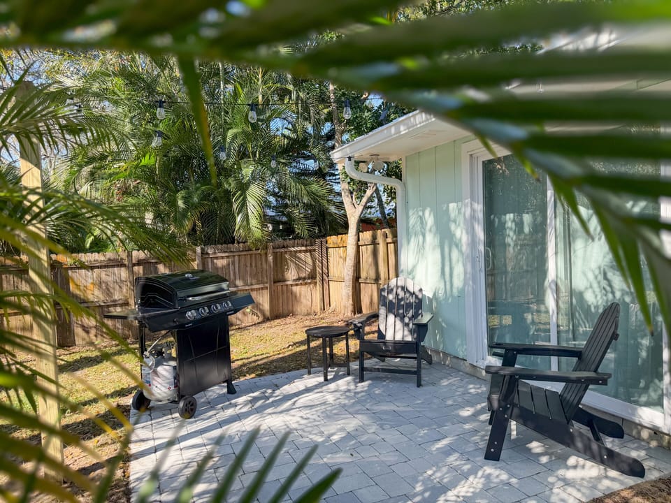 Back patio with solar lights and grill