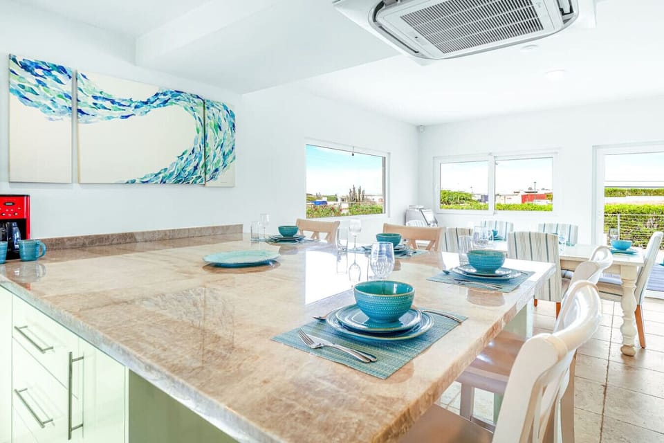 Set the scene for unforgettable meals! Gather around this spacious dining area, where great food meets stunning views, making every meal a special occasion.