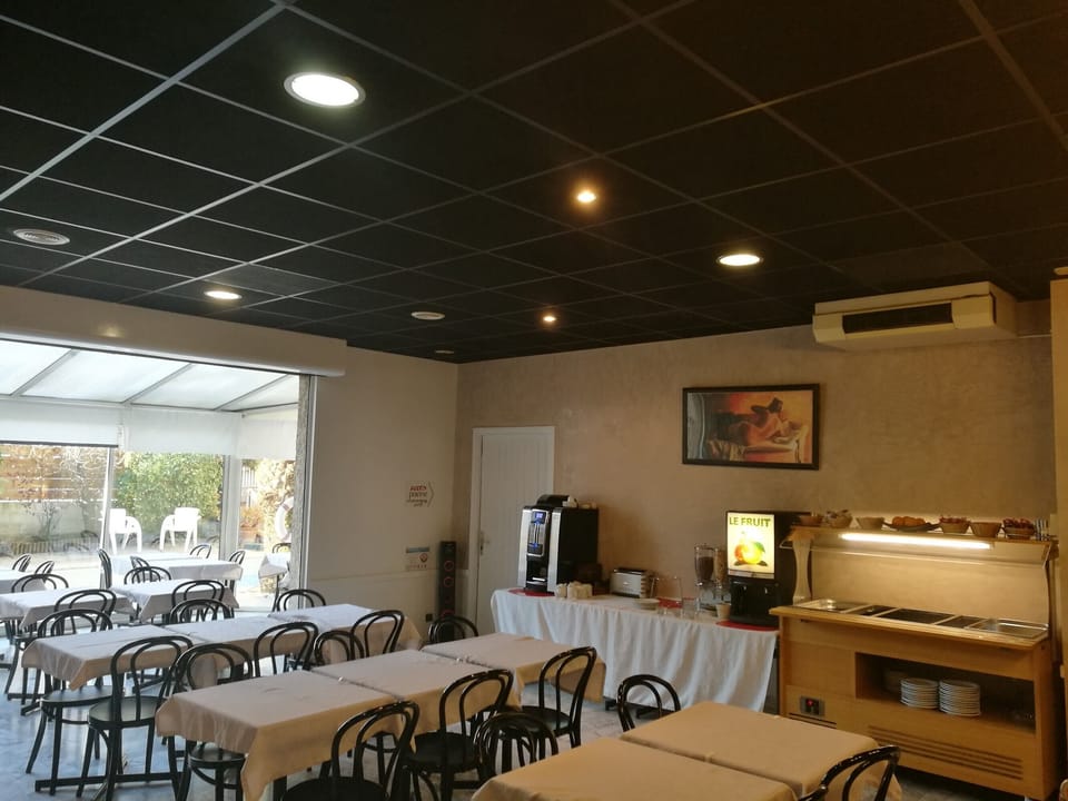 Dine together in a spacious room set for easy conversation