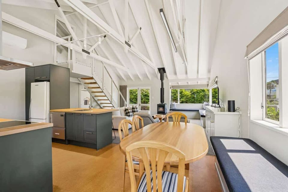 Sunny open plan kitchen, dining, living space