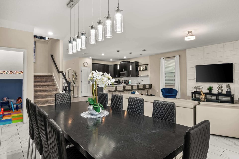 Open floor plan connects downstairs living room, kitchen and dining room, providing plenty of room for all to gather!