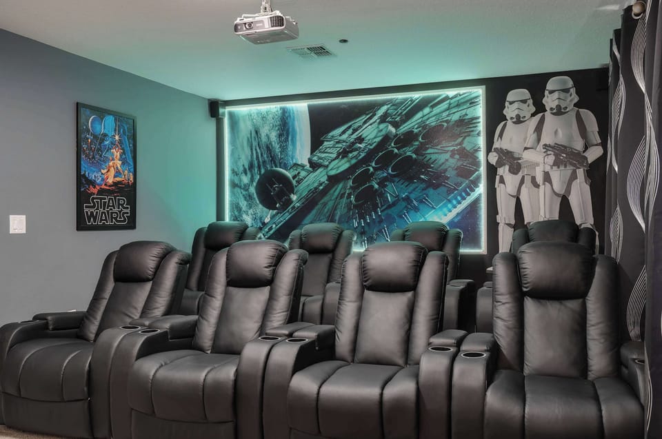 Private in-home movie theatre with HUGE projector screen and surround sound! Reclining theater seating for 8 + extra room to accommodate 10+! Great for family movie nights or for big game day viewing!