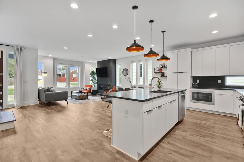 Chef’s kitchen with stainless appliances and open-concept design