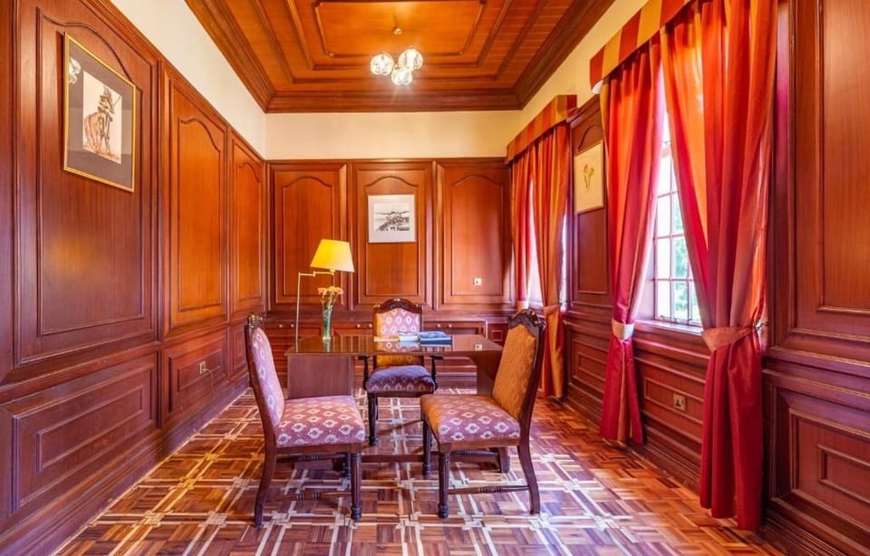 Settle in for focused work at a quiet, classic writing desk.