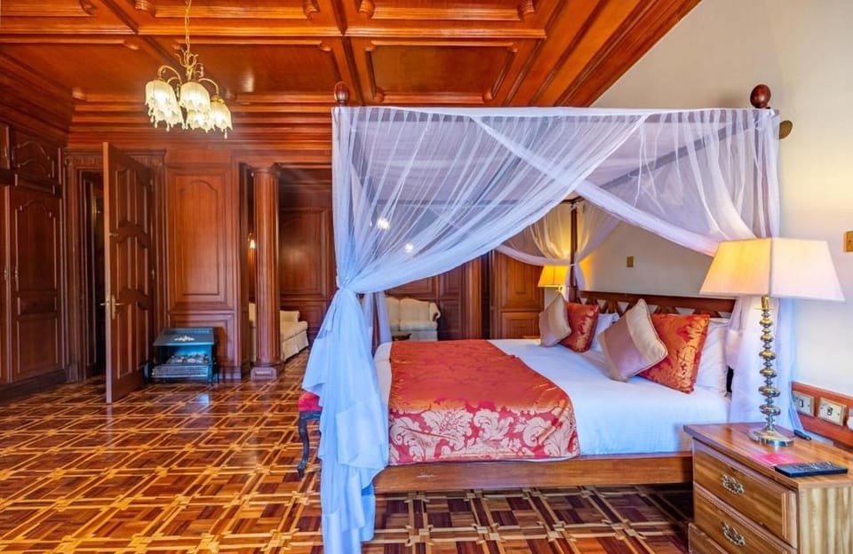 Unwind beneath a dreamy canopy in richly crafted wood serenity.