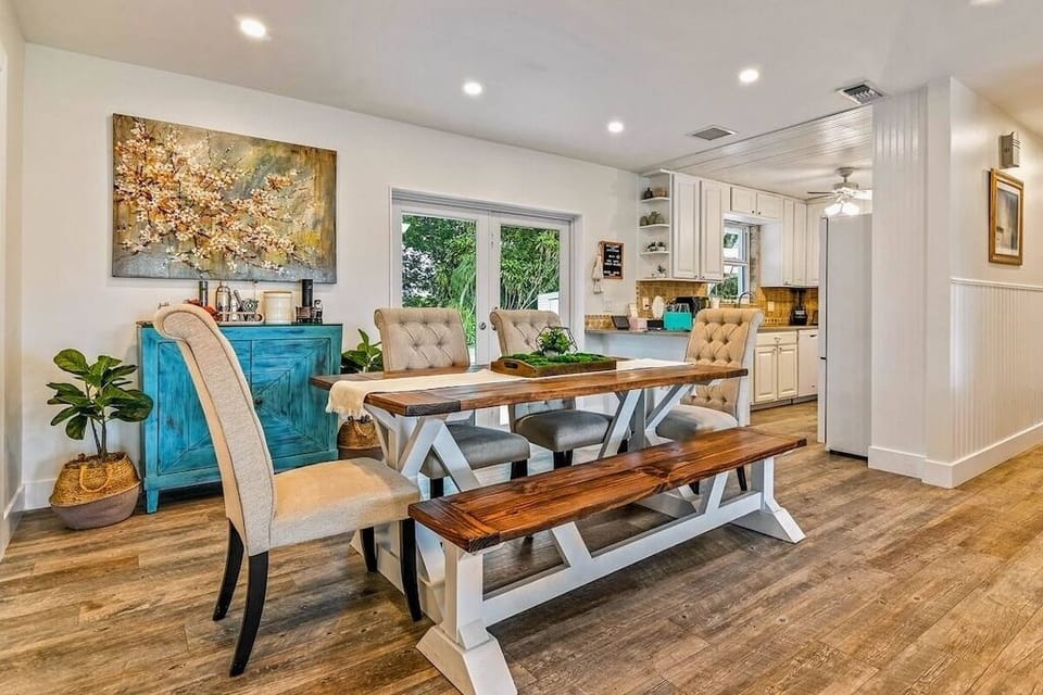 Dining area, complete with a charming farmhouse table that comfortably seats 6