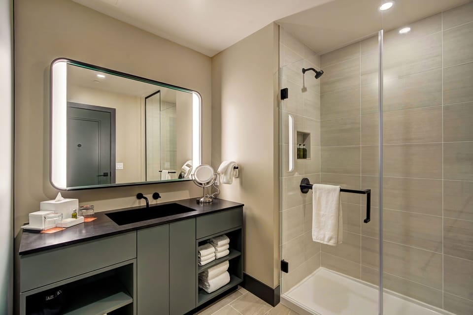 Clean, modern bathroom with quality fixtures to refresh after a day on the slopes.