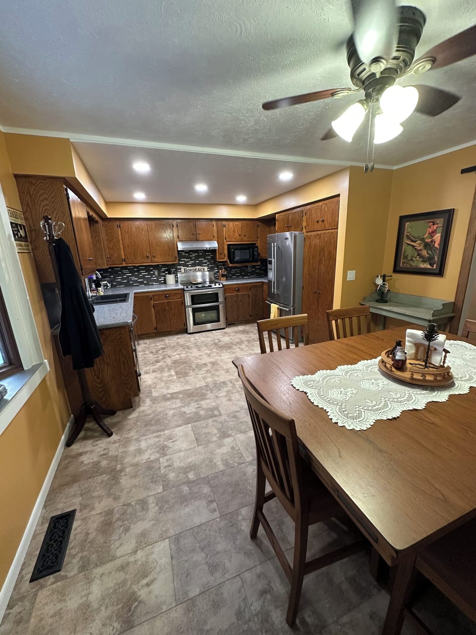 Kitchen and dinning table has ample storage and lots of counter top space. 
