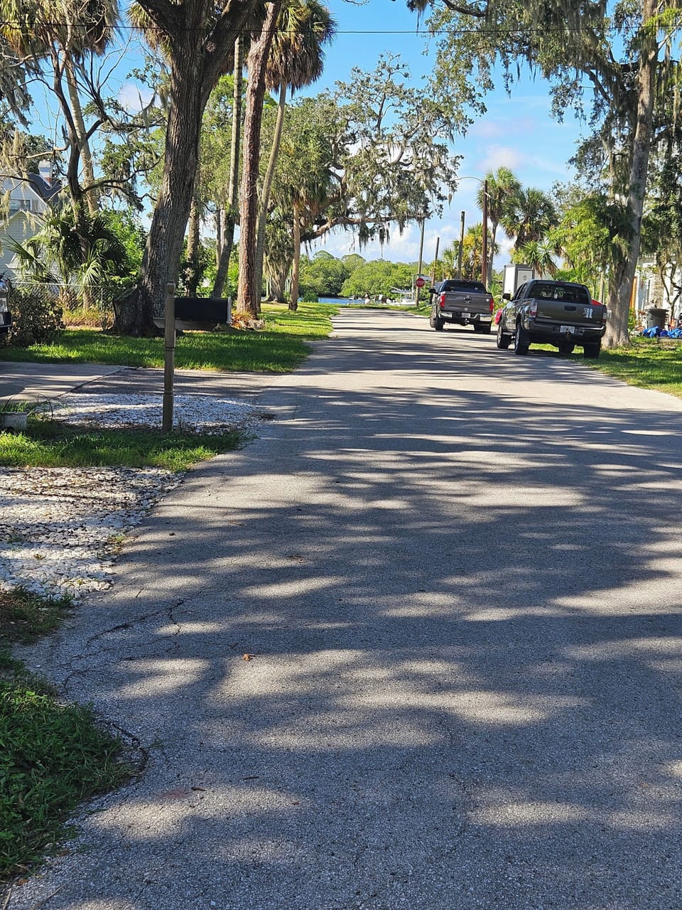 View from the front of the house to the neighborhood dock on the water