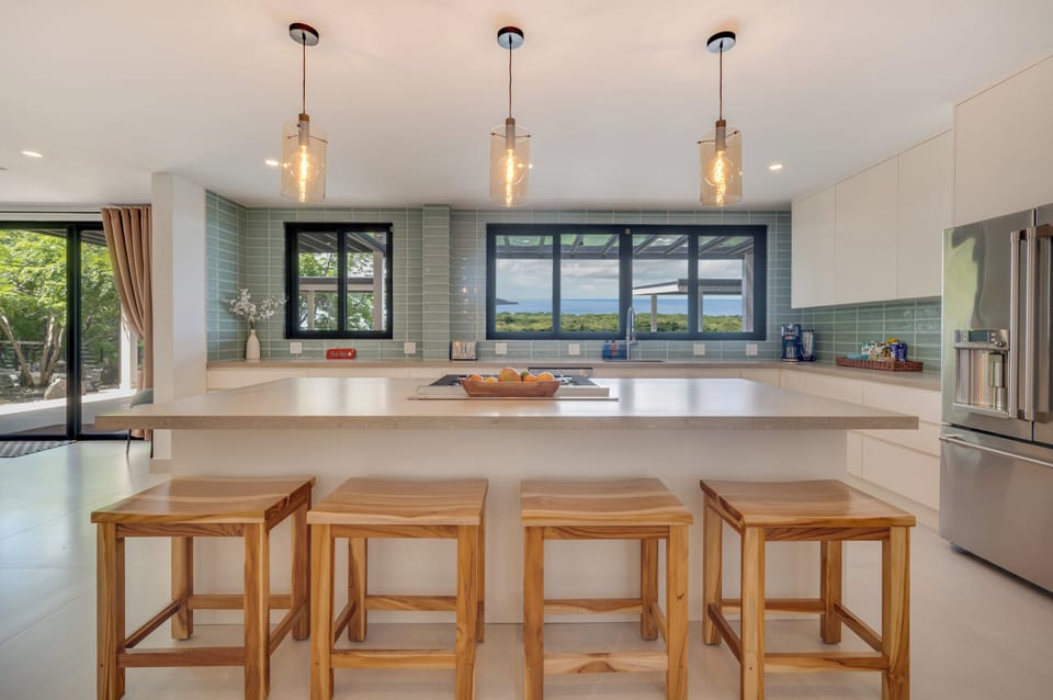 The Pinnacle kitchen — refined design, ocean views, and space to gather.
