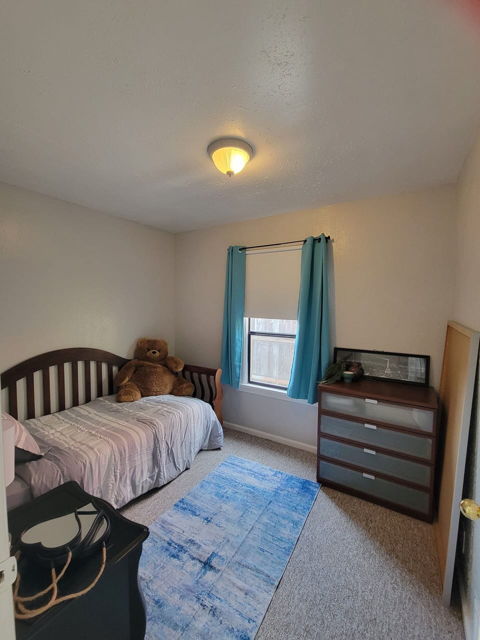 Upstairs twin bed with pull out trundle.