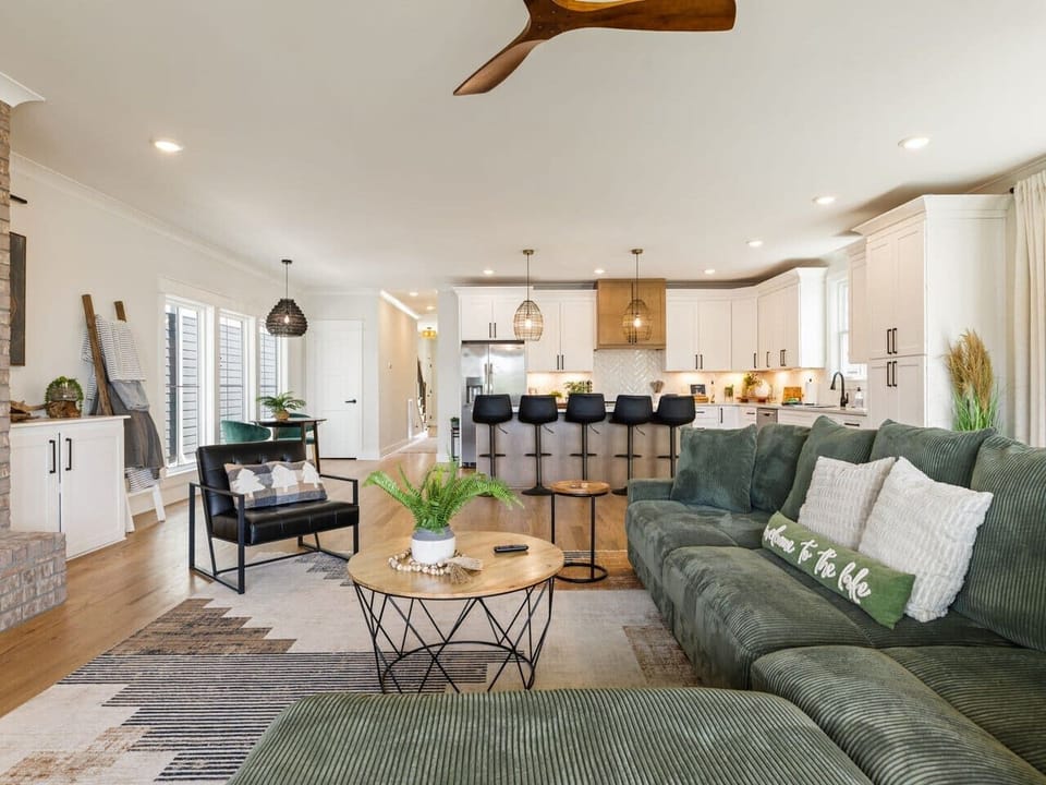 Cozy living room with fireplace & mounted tv