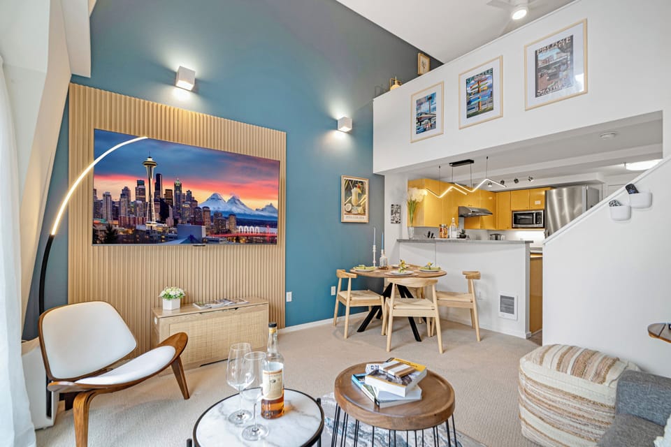 Designer Living: Relaxing in a stylish room with iconic Space Needle views.