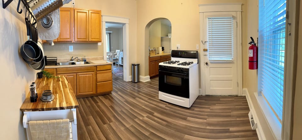 Full Kitchen: Gas stove, all the pots, pans, baking sheets & cooking utensils