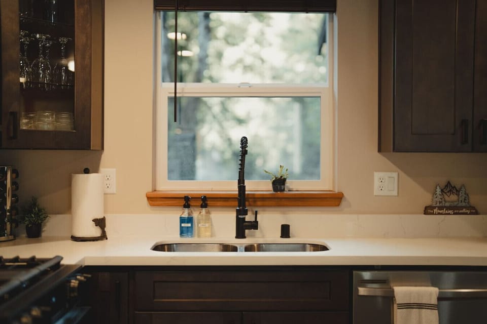 Kitchen Window above Sink overlooks the backyard and creek!