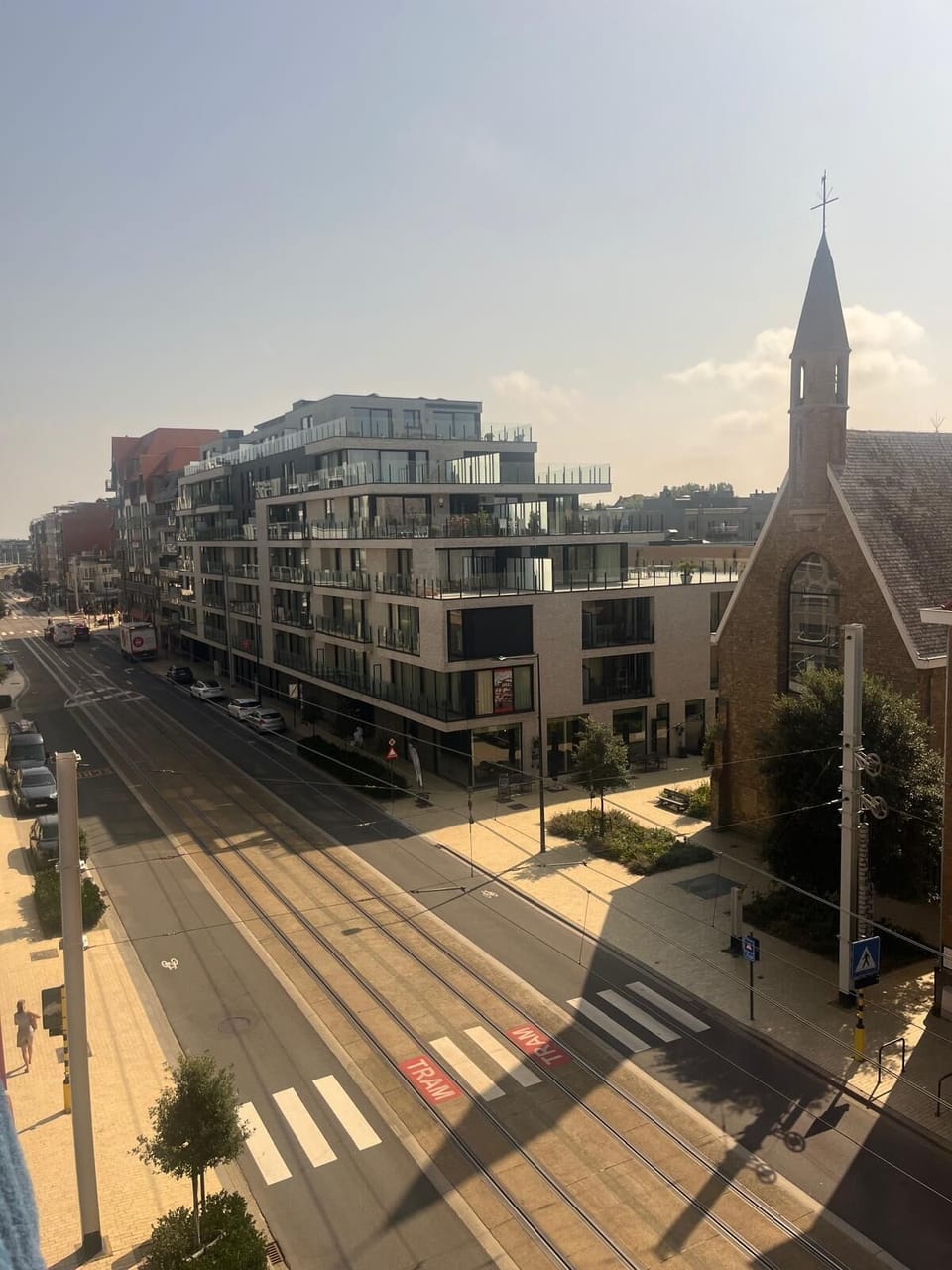 Balcony View Over Charming City Street
Enjoy sweeping views of the lively town from your private balcony.