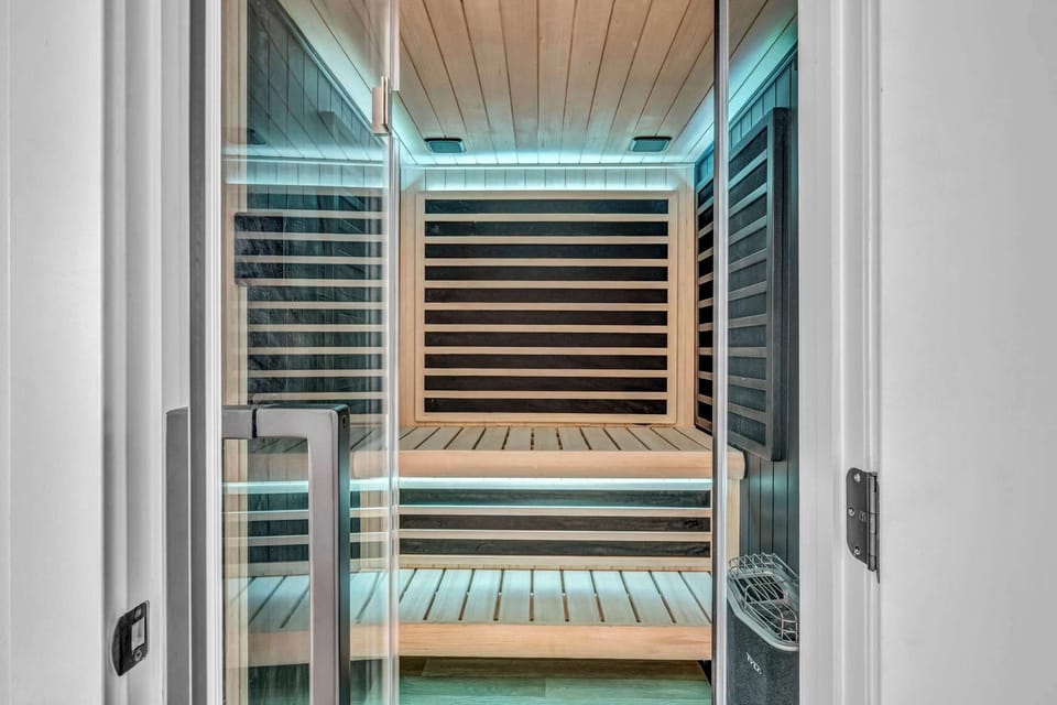 Private indoor sauna with modern wood finishes perfect for relaxing and recharging after a long day.