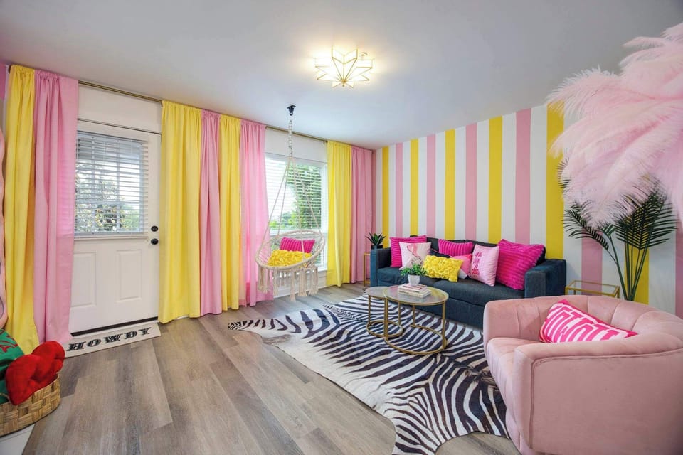 Swing into relaxation with vibrant décor and plush seating that's pure Nashville fun!