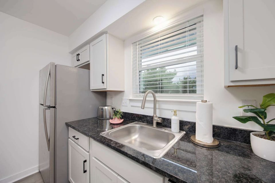 Kitchen Haven: Modern appliances and sleek counters, perfect for culinary adventures!
