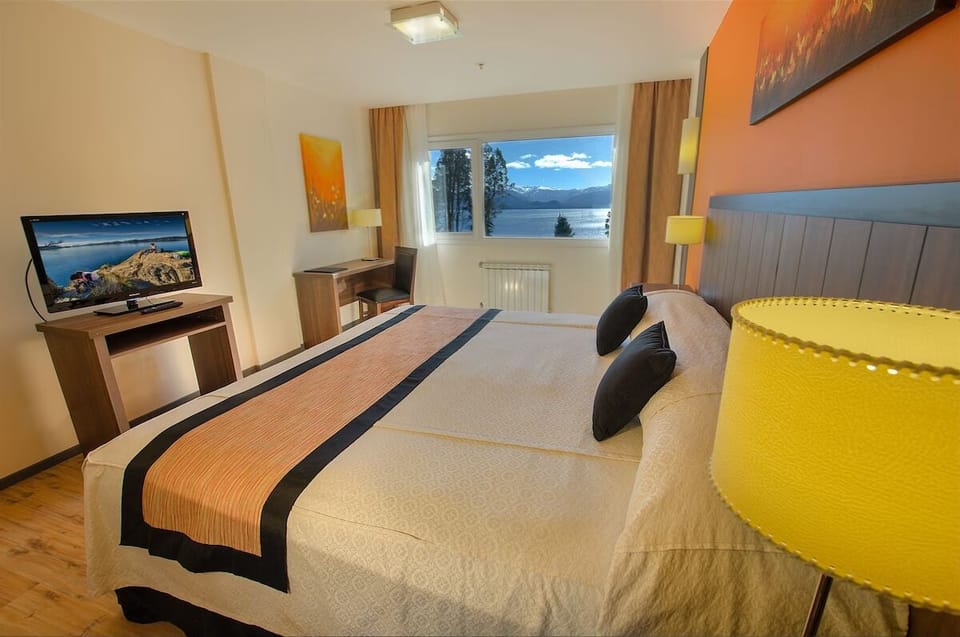 Unwind in a sunlit room with mountain panoramas beyond.