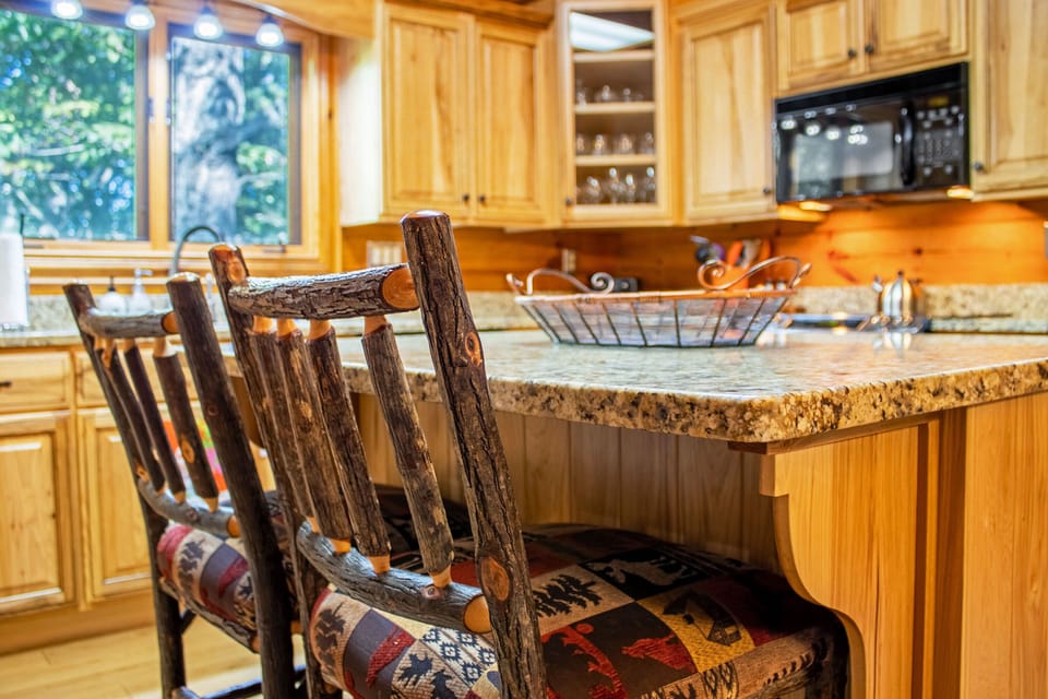Full kitchen includes stove top, oven, refrigerator, microwave, dishwasher, and more!