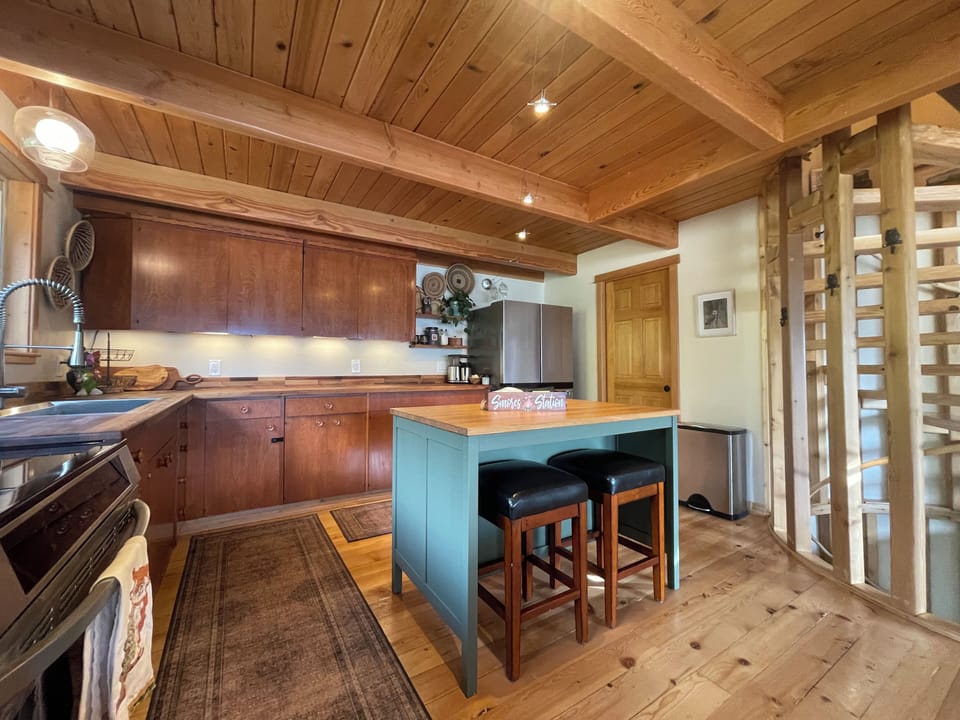 Functional kitchen- open for socializing and taking in the views while you cook