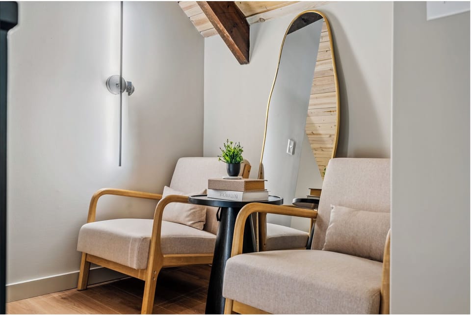 The top floor features a cute, quaint sitting area. 