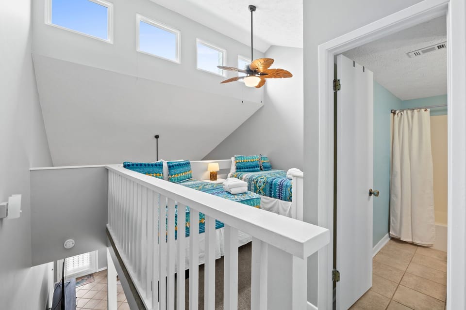 Natural lighting pours in through elevated windows, creating a bright and cheerful atmosphere throughout the day.