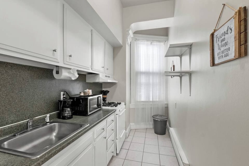 Fully stocked kitchen with microwave, stove, oven, coffee maker, toaster, fridge and freezer. Kitchen comes equipped with all pots, pans, cookware, dishware and flatware.  All the amenities you need to make a great home-cooked meal or a night to orde