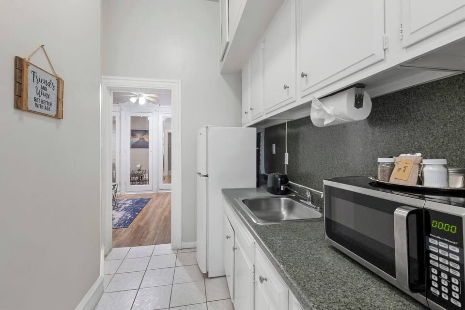 Fully equipped kitchen with modern appliances and ample counter space for all your cooking needs.