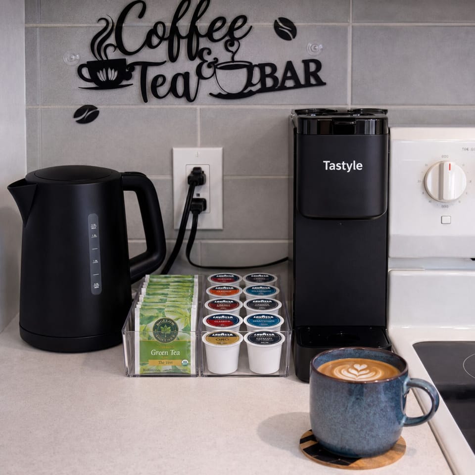 Fully equipped coffee & tea station with complimentary selections.