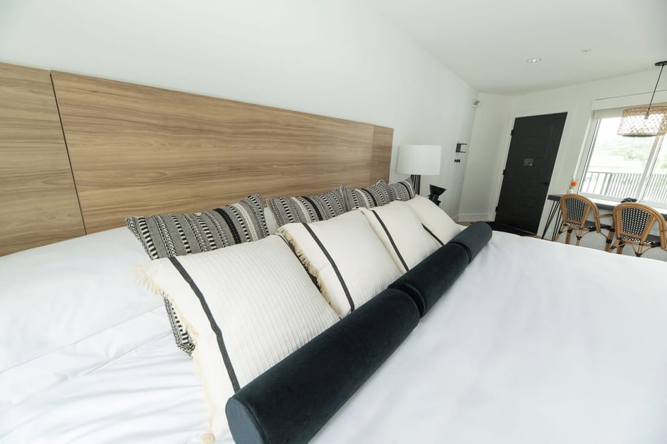 Sink into crisp linens and pillows for deep sleep.