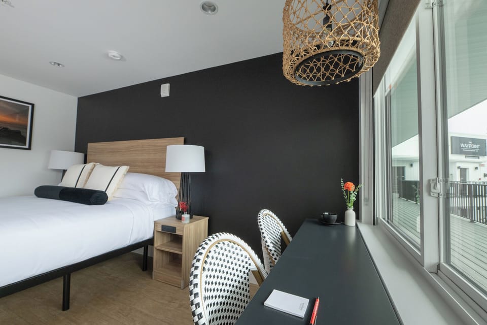 Settle in by the window for coffee, work, or planning.