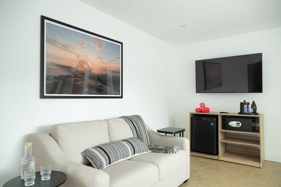 Kick back on the sofa and enjoy movies with in-room snacks.