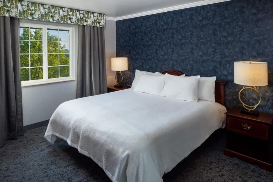 Relax into plush bedding and drift off in quiet comfort.