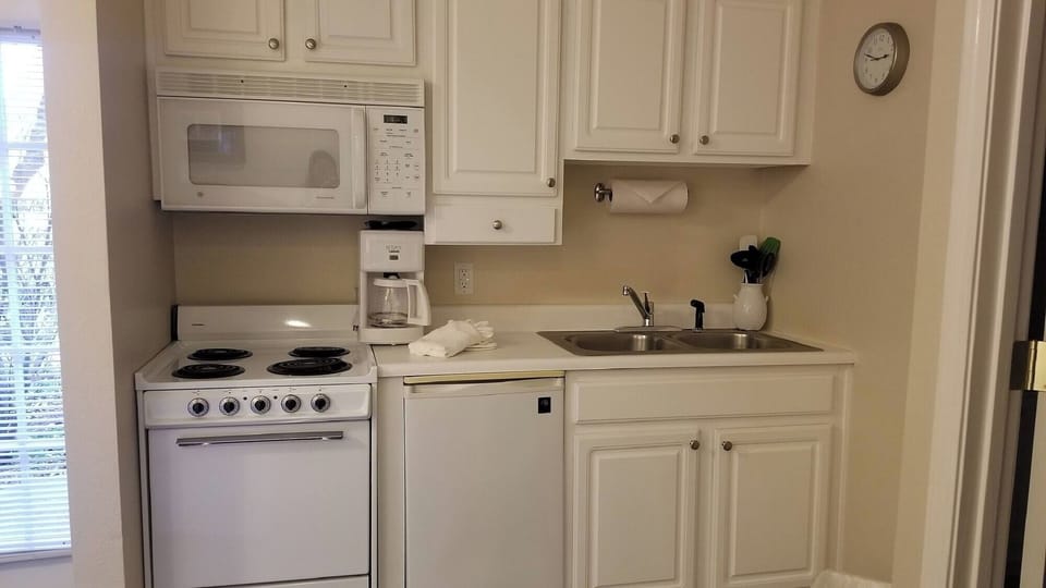 Cook simple meals easily with a bright, practical kitchenette.