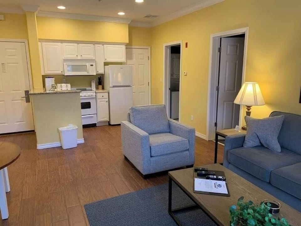 Spread out in the open-plan suite with room to lounge.