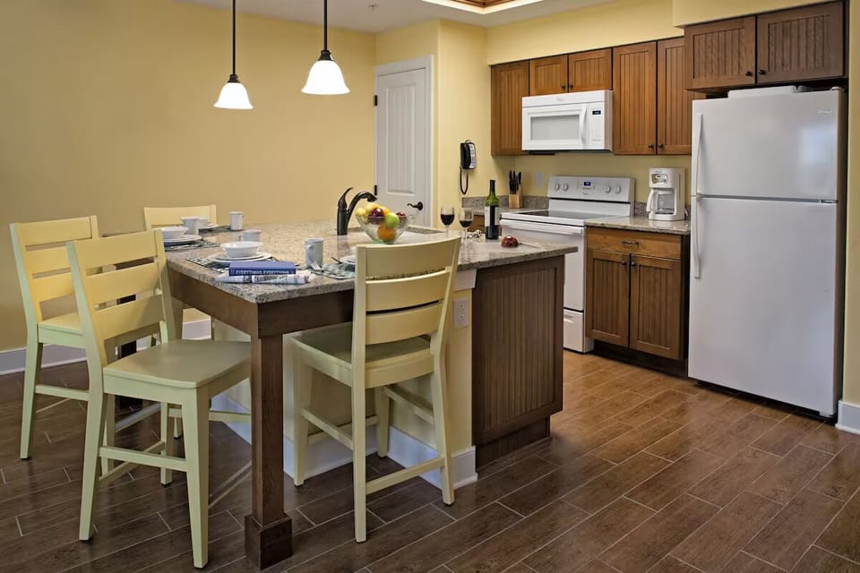 Gather at the island for snacks, coffee, and conversation.