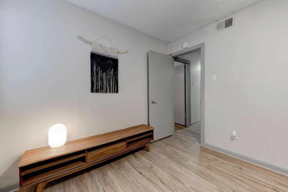 Simple, airy bedroom design with clean lines and a calm atmosphere.