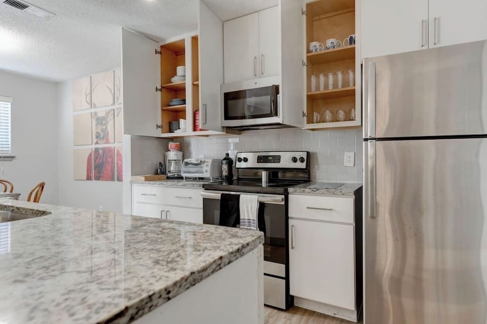 Full view of the kitchen showcasing a functional layout and ample workspace.