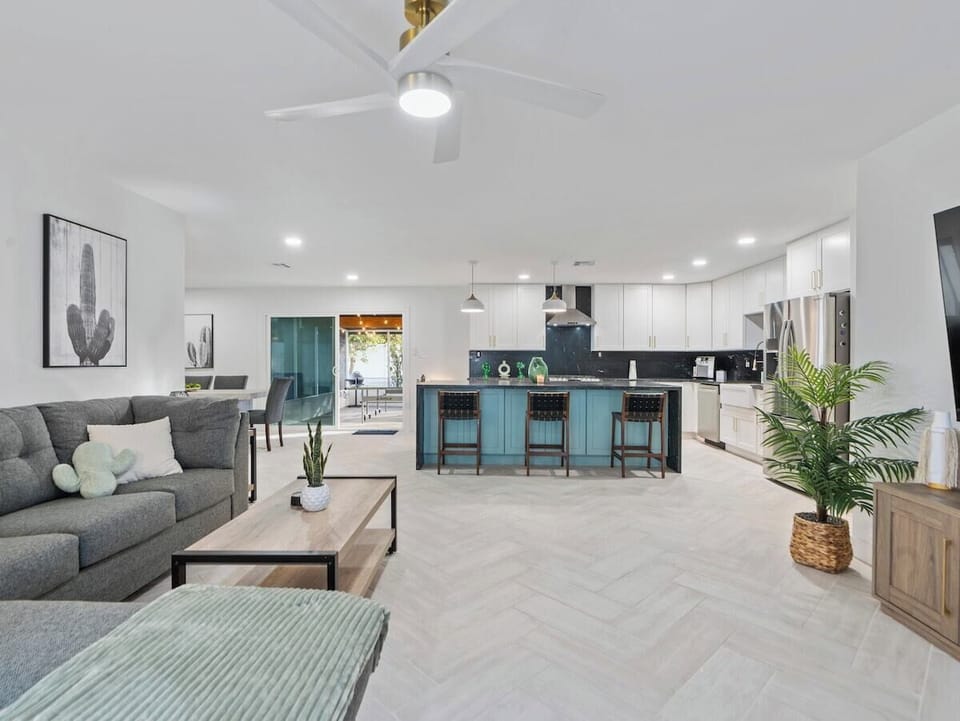 With ample seating and a stylish ambiance, this space is perfect for enjoying home-cooked meals or takeout from local eateries.